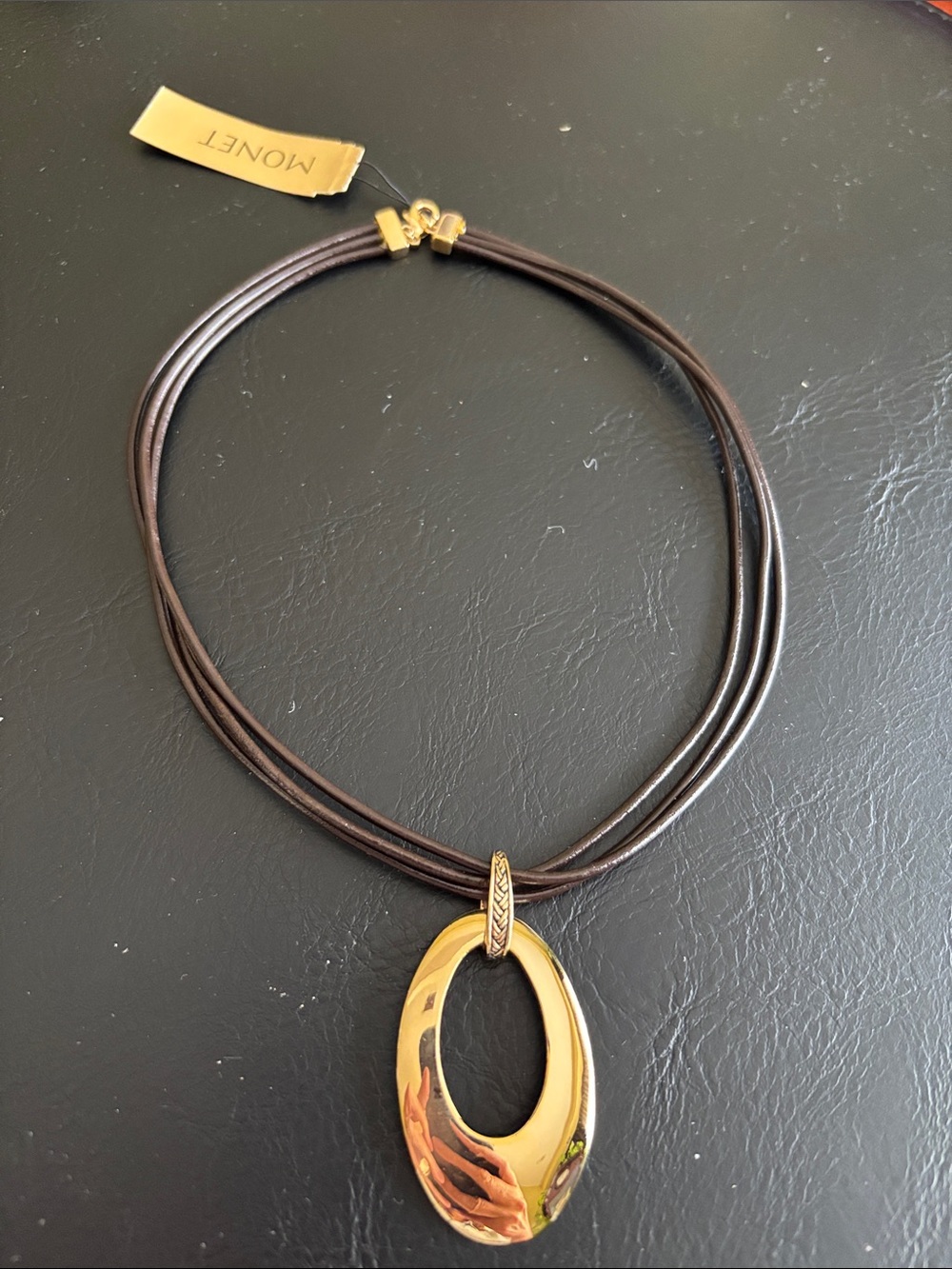 Monet Gold Oval Pendant on Brown Multi-Strand Cord